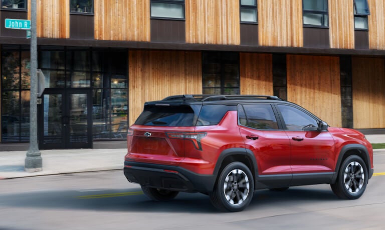 2027 Chevy Equinox driving in the city