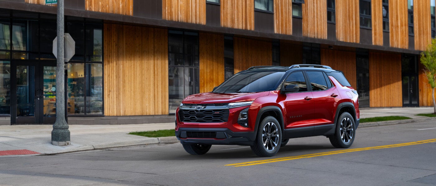 2027 Chevy Equinox waiting at a city stoplight